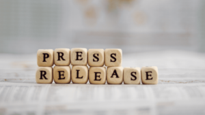 Letter blocks that spell out Press Release